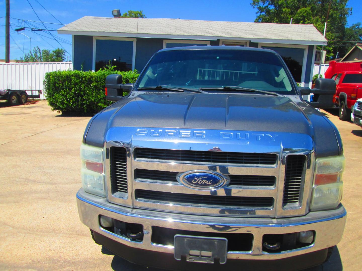 2010 GRAY Ford F-250 SD Cabela Crew Cab 4WD (1FTSW2B58AE) with an 5.4L V8 SOHC 16V engine, located at 1815 NE 28th St., Fort Worth, TX, 76106, (817) 625-6251, 32.795582, -97.333069 - Photo#2