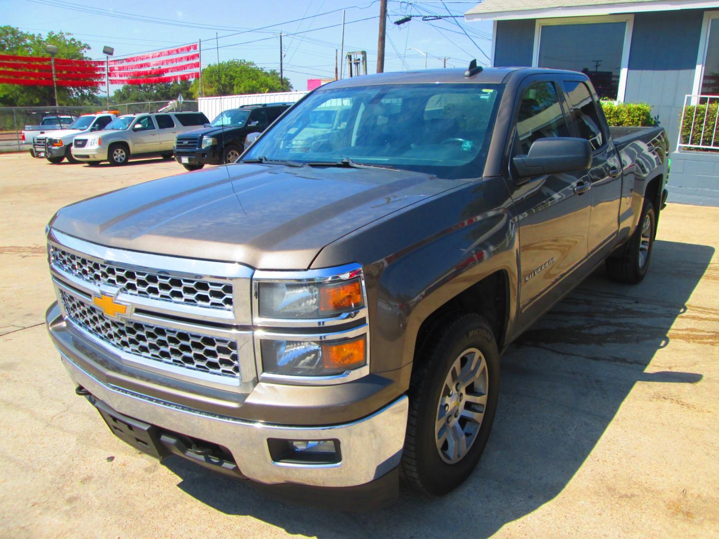 2015 BROWN Chevrolet Silverado 1500 LT Double Cab 4WD (1GCVKREC4FZ) with an 5.3L V8 OHV 16V engine, 6-Speed Automatic transmission, located at 1815 NE 28th St., Fort Worth, TX, 76106, (817) 625-6251, 32.795582, -97.333069 - Photo#0