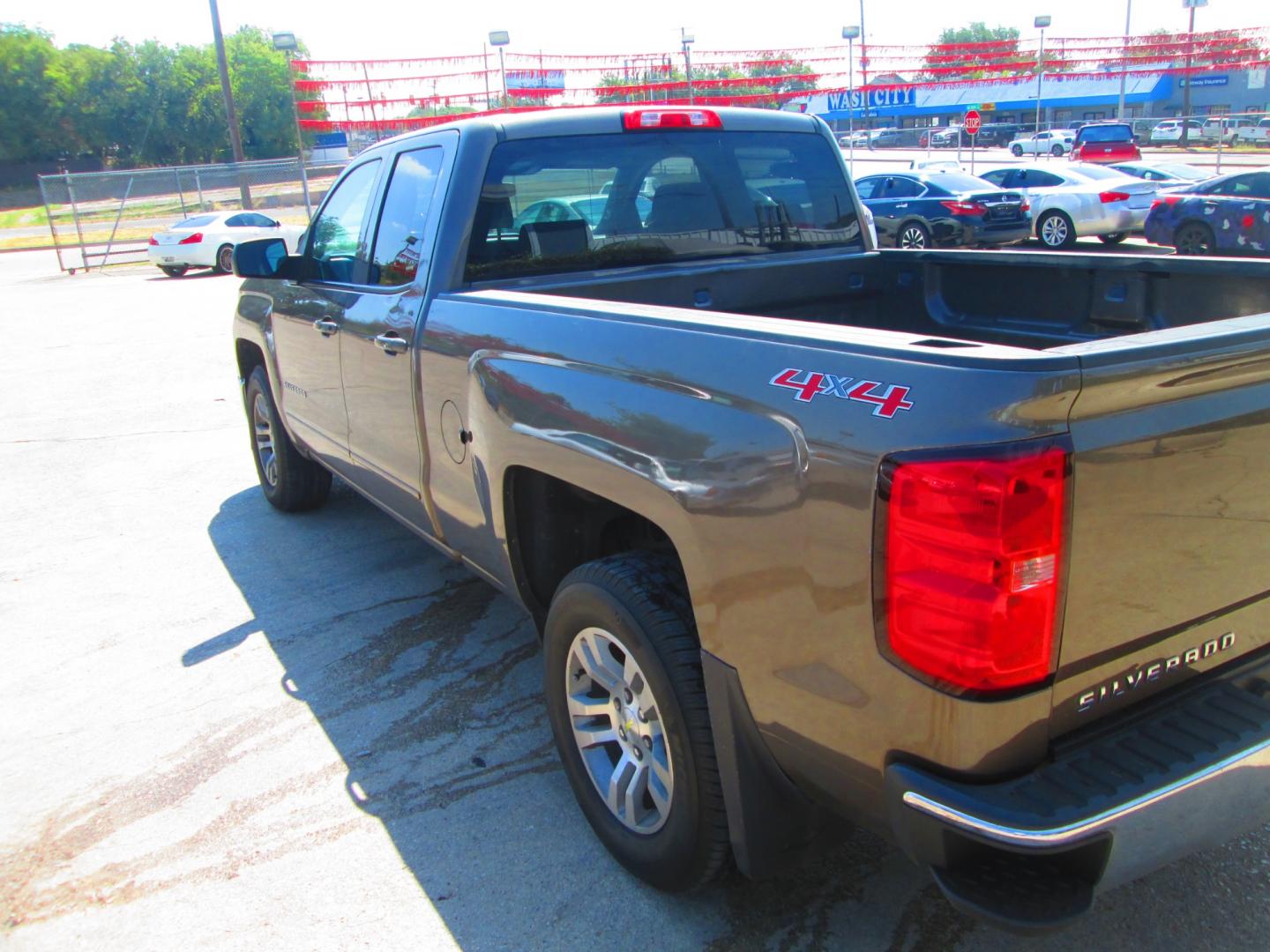 2015 BROWN Chevrolet Silverado 1500 LT Double Cab 4WD (1GCVKREC4FZ) with an 5.3L V8 OHV 16V engine, 6-Speed Automatic transmission, located at 1815 NE 28th St., Fort Worth, TX, 76106, (817) 625-6251, 32.795582, -97.333069 - Photo#9