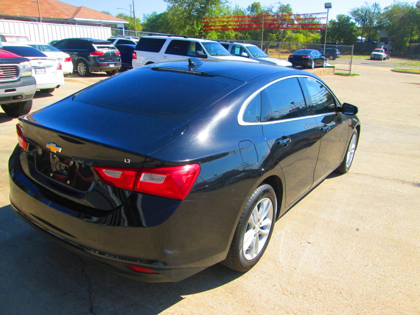 2018 BLACK Chevrolet Malibu LT (1G1ZD5ST3JF) with an 1.5L L4 DOHC 16V engine, 6A transmission, located at 1815 NE 28th St., Fort Worth, TX, 76106, (817) 625-6251, 32.795582, -97.333069 - Photo#4