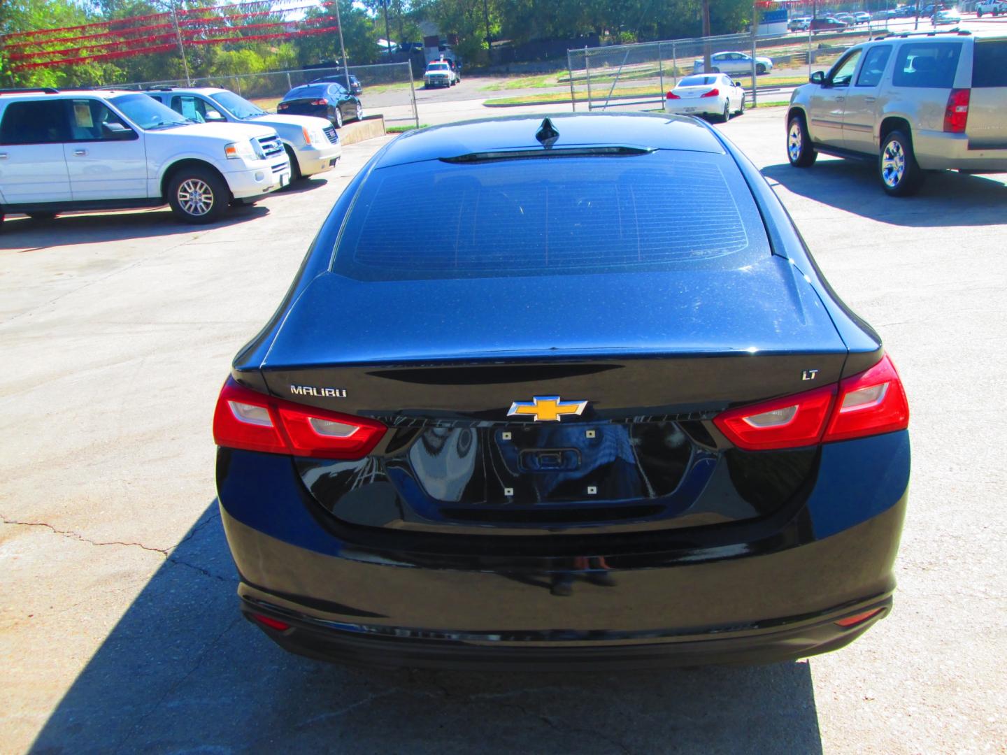 2018 BLACK Chevrolet Malibu LT (1G1ZD5ST3JF) with an 1.5L L4 DOHC 16V engine, 6A transmission, located at 1815 NE 28th St., Fort Worth, TX, 76106, (817) 625-6251, 32.795582, -97.333069 - Photo#5