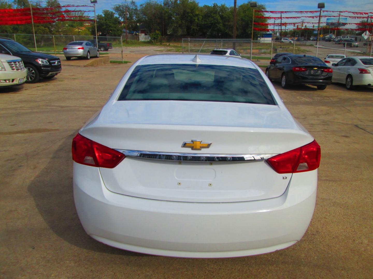 2019 WHITE Chevrolet Impala LT (1G11Z5SA8KU) with an 2.5L L4 DOHC 16V engine, 6A transmission, located at 1815 NE 28th St., Fort Worth, TX, 76106, (817) 625-6251, 32.795582, -97.333069 - Photo#5