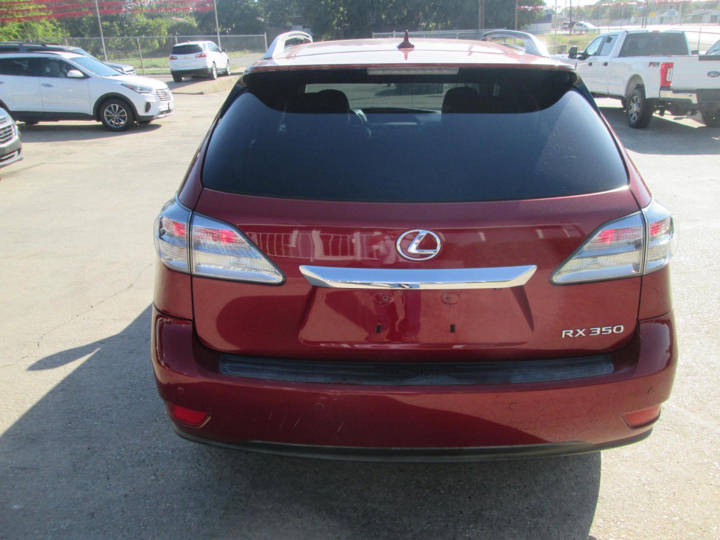 2011 RED Lexus RX 350 FWD (2T2ZK1BA2BC) with an 3.5L V6 DOHC 24V engine, 5-Speed Automatic transmission, located at 1815 NE 28th St., Fort Worth, TX, 76106, (817) 625-6251, 32.795582, -97.333069 - Photo#4