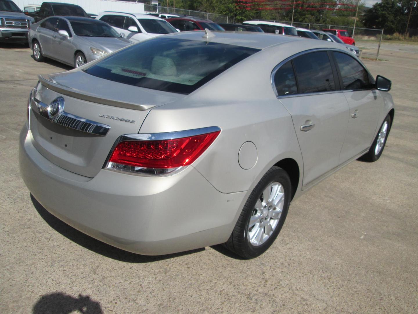 2011 GOLD /TAN Buick LaCrosse CX (1G4GA5EC1BF) with an 2.4L L4 DOHC 16V engine, 6-Speed Automatic Overdrive transmission, located at 1815 NE 28th St., Fort Worth, TX, 76106, (817) 625-6251, 32.795582, -97.333069 - Photo#3