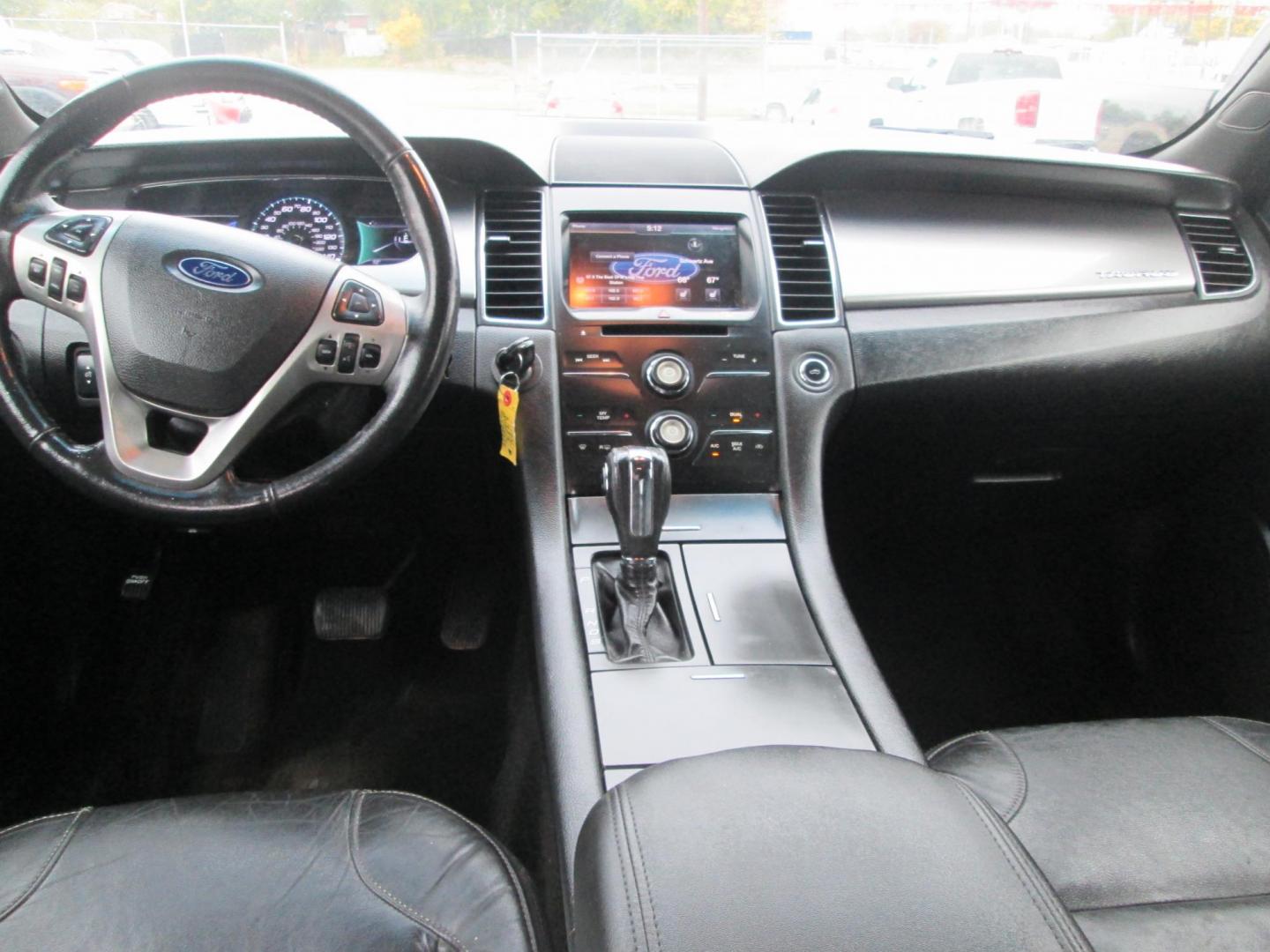 2014 GRAY Ford Taurus SEL FWD (1FAHP2E80EG) with an 3.5L V6 DOHC 24V engine, 6-Speed Automatic transmission, located at 1815 NE 28th St., Fort Worth, TX, 76106, (817) 625-6251, 32.795582, -97.333069 - Photo#10