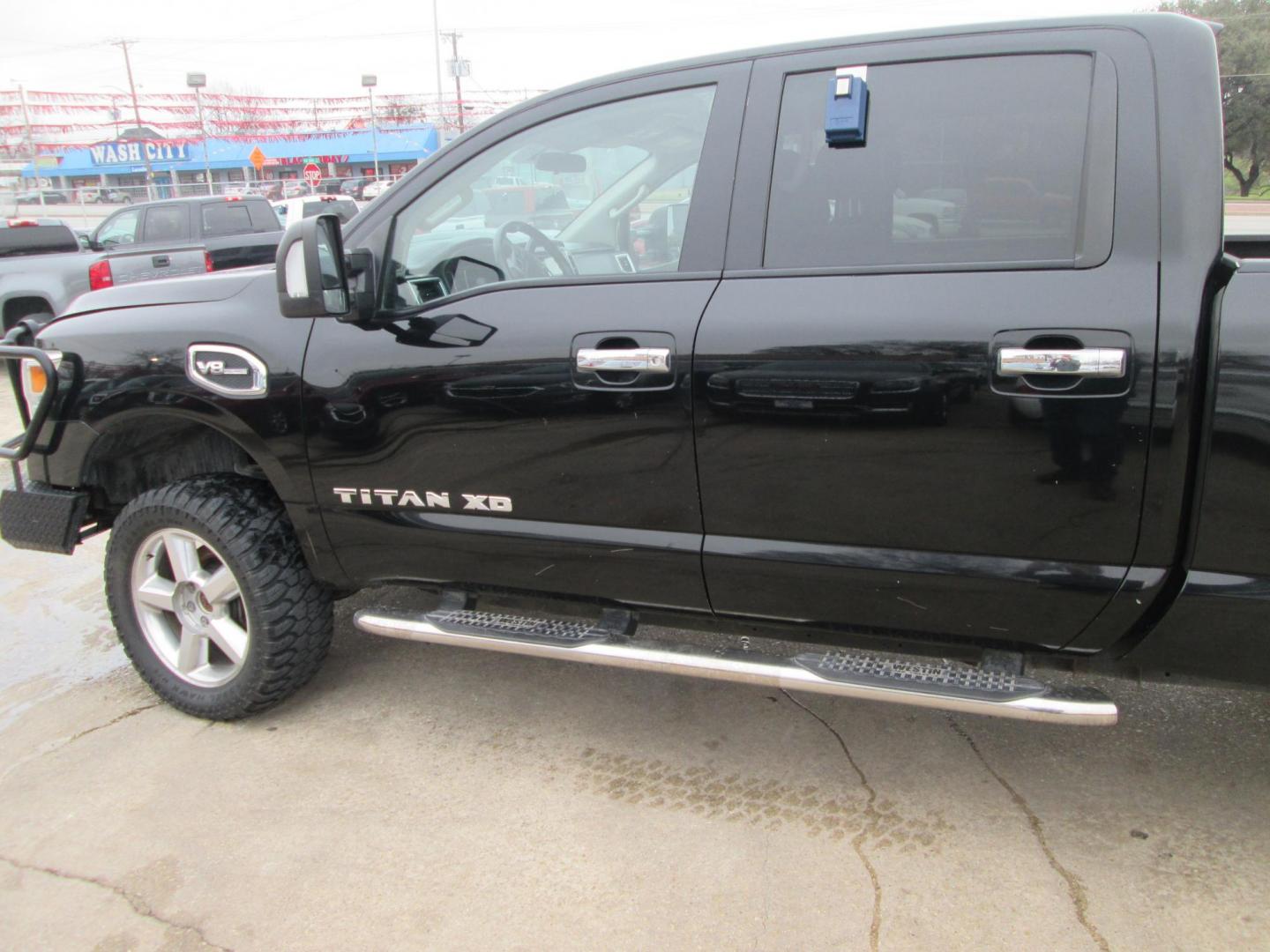 2017 BLACK Nissan Titan XD SV 4WD (1N6AA1F37HN) with an 5.6L V8 DOHC 32V engine, 6A transmission, located at 1815 NE 28th St., Fort Worth, TX, 76106, (817) 625-6251, 32.795582, -97.333069 - Photo#8