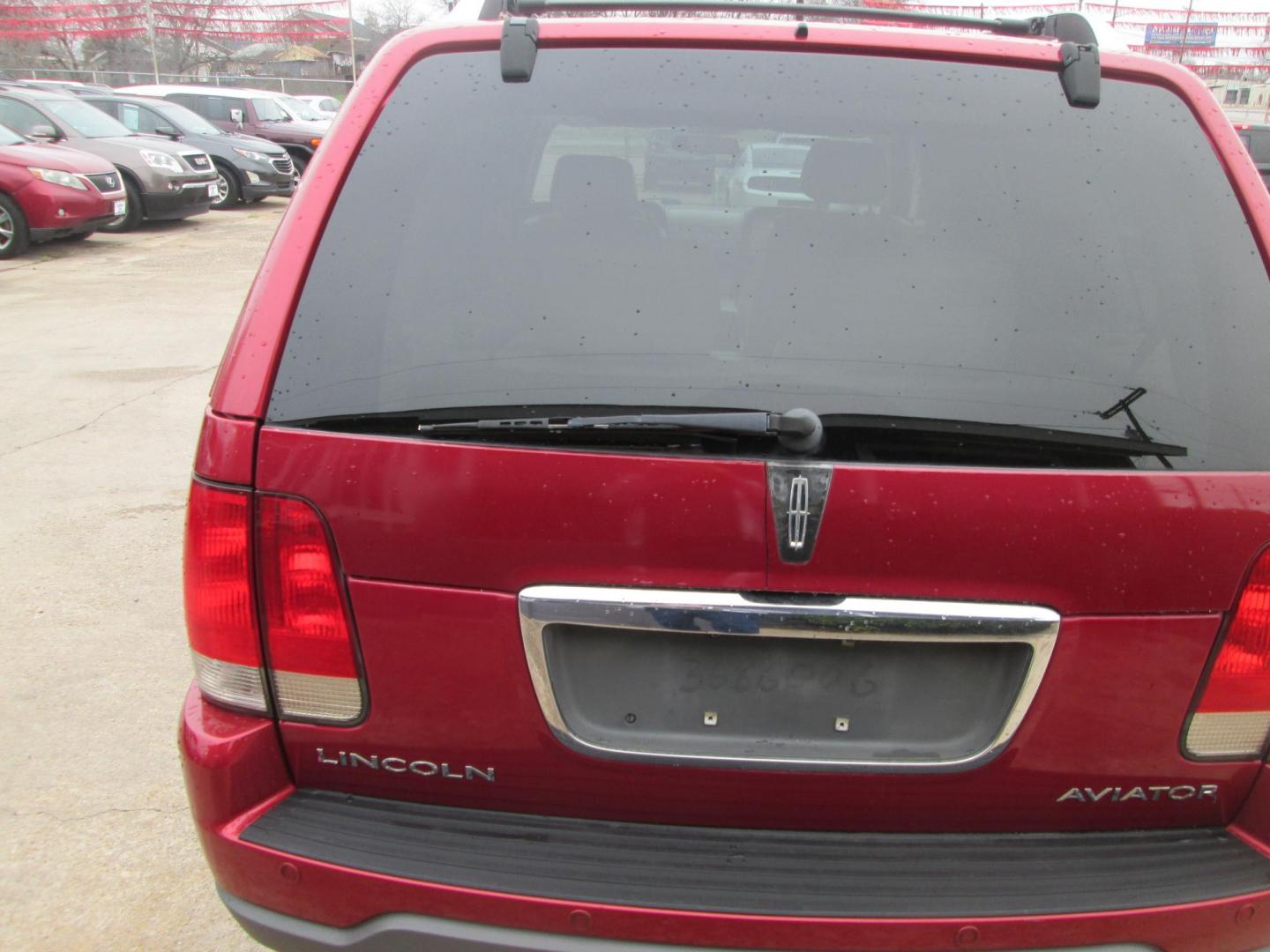 2003 RED Lincoln Aviator Luxury 2WD (5LMEU68H23Z) with an 4.6L V8 DOHC 32V engine, 5-Speed Automatic Overdrive transmission, located at 1815 NE 28th St., Fort Worth, TX, 76106, (817) 625-6251, 32.795582, -97.333069 - Photo#5