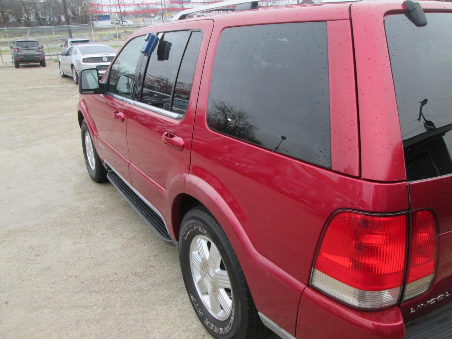 2003 RED Lincoln Aviator Luxury 2WD (5LMEU68H23Z) with an 4.6L V8 DOHC 32V engine, 5-Speed Automatic Overdrive transmission, located at 1815 NE 28th St., Fort Worth, TX, 76106, (817) 625-6251, 32.795582, -97.333069 - Photo#8